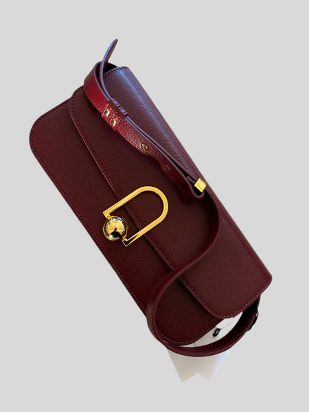 Maestoso burgundy Eon baguette bag